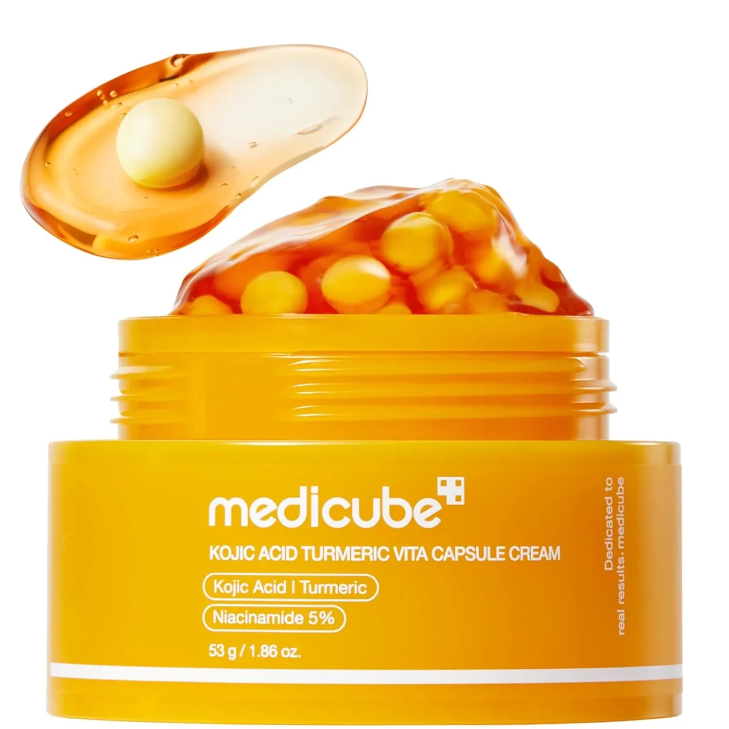 Medicube Kojic Acid Turmeric Vita Capsule Cream jar showing bright yellow beads and glossy gel texture.