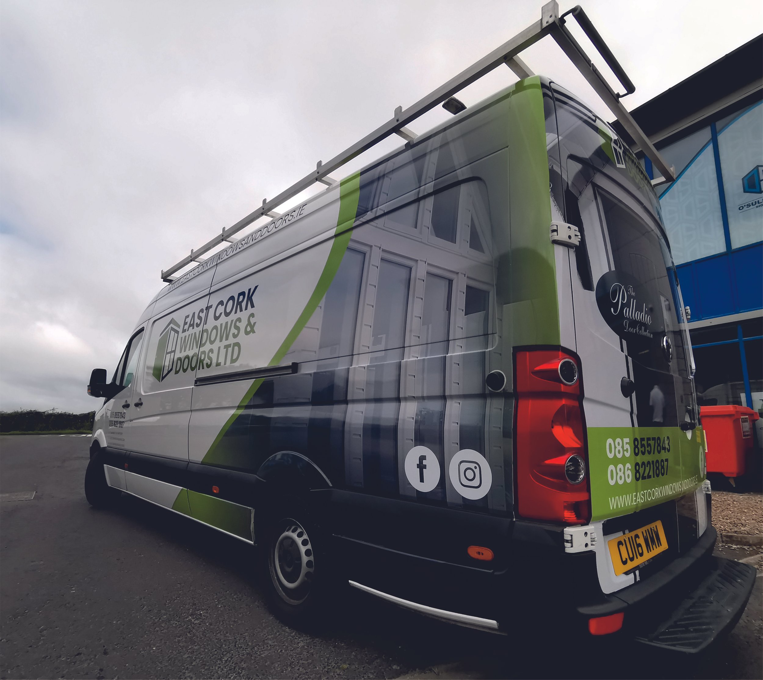 Commercial van with branding on the side, featuring contact information and social media icons. Vehicle wrap. Vehicle Graphics. Commercial Vehicle Branding. Signmakers Cork & Kerry, Ireland.