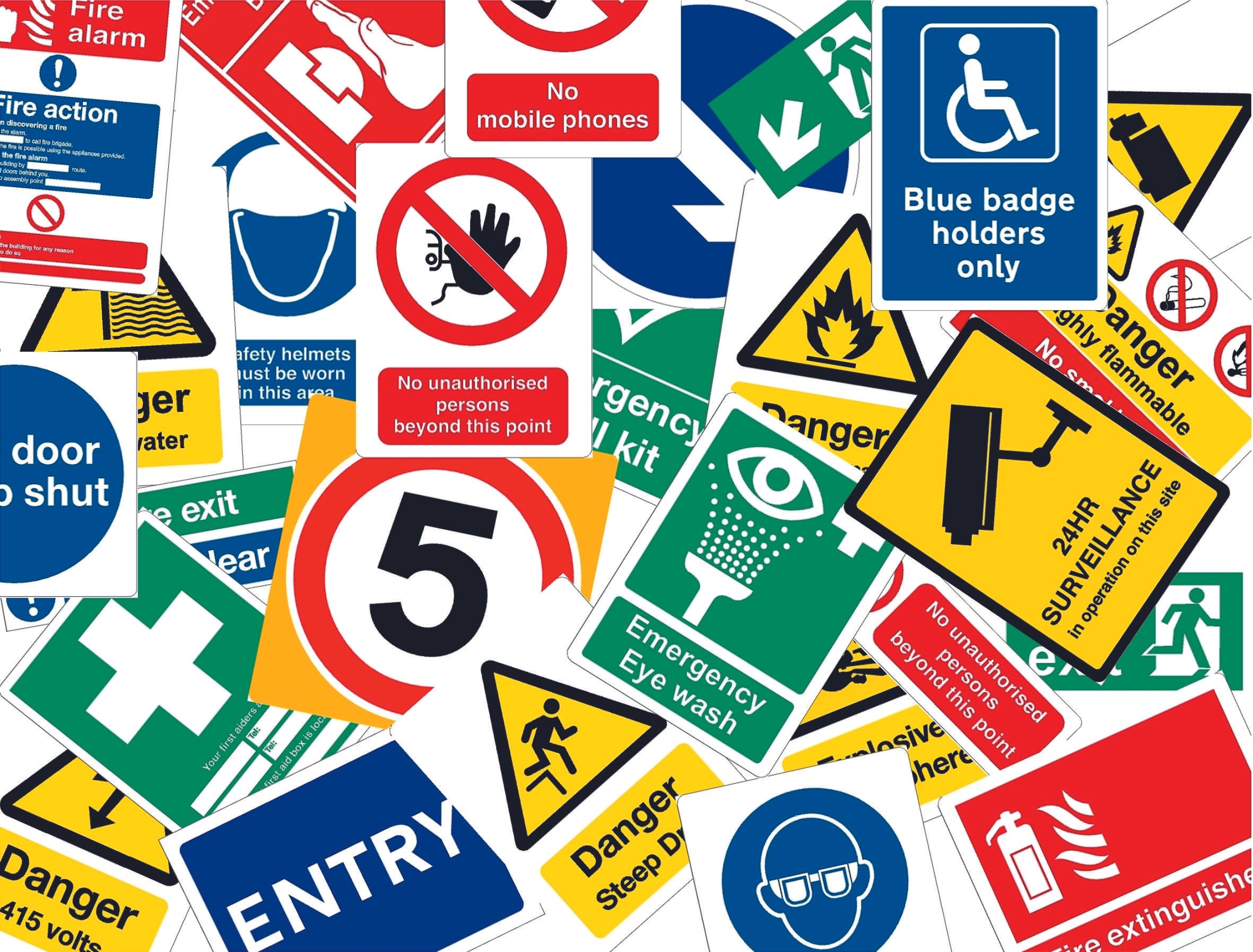 A collage of various safety and warning signs, including fire alarms, restricted access, danger, surveillance, and emergency instructions, with diverse symbols and colours. Shopfront Signage. Bespoke. Custom Signs. Signmakers Cork & Kerry, Ireland.