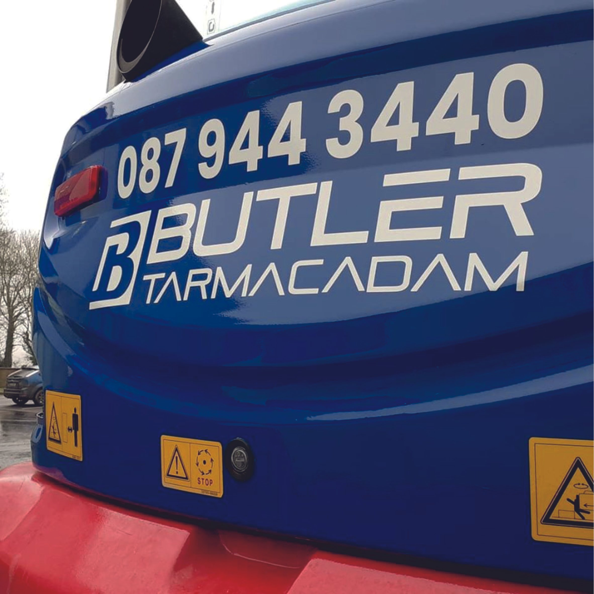Various caution symbols are visible. Vehicle wrap. Vehicle Graphics. Commercial Vehicle Branding. Plant Hire Signage. Signmakers Cork & Kerry, Ireland.