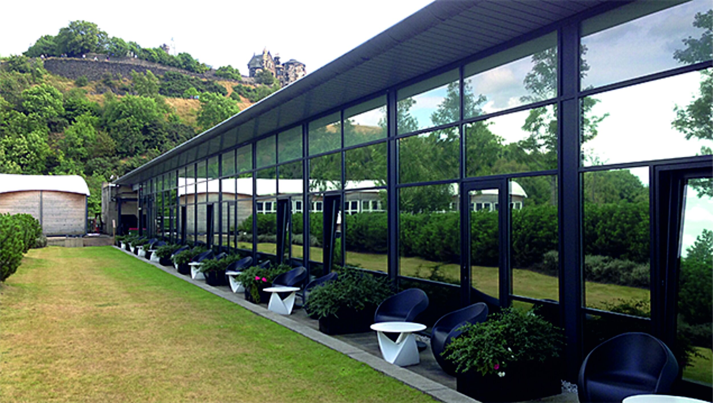 Modern building with large reflective windows privacy film tint. Signmakers Cork & Kerry, Ireland.