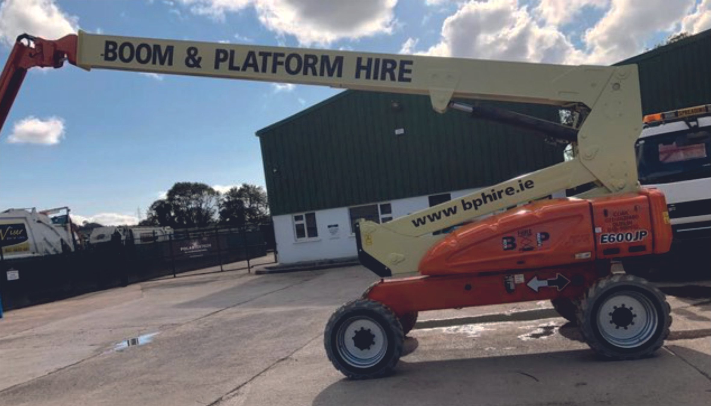 Articulating boom lift with logos and text. Vehicle wrap. Vehicle Graphics. Commercial Vehicle Branding. Plant Hire Signage. Signmakers Cork & Kerry, Ireland.