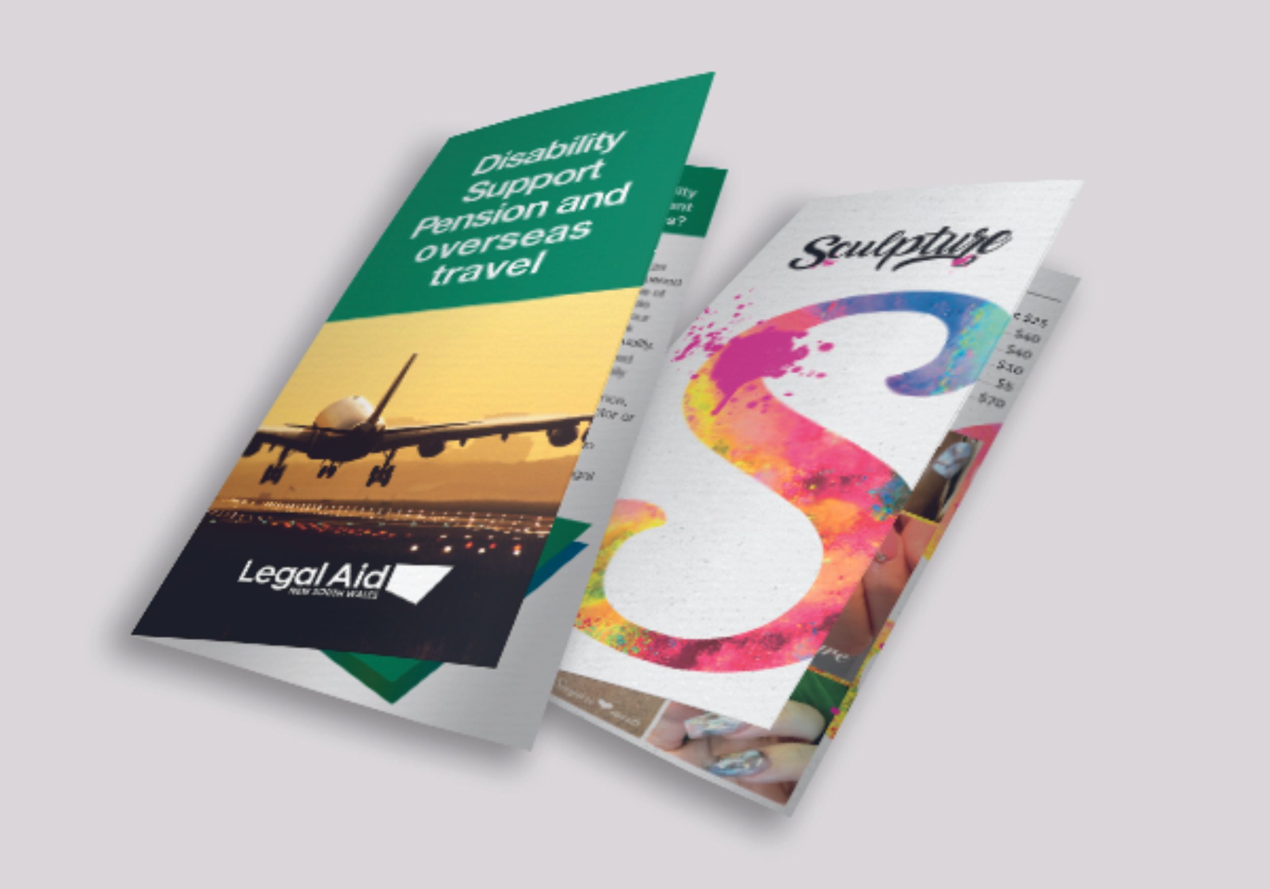 Leaflets flyers brochures with colorful designs, including a plane graphic and text about disability support and travel. Signmakers Cork & Kerry, Ireland.