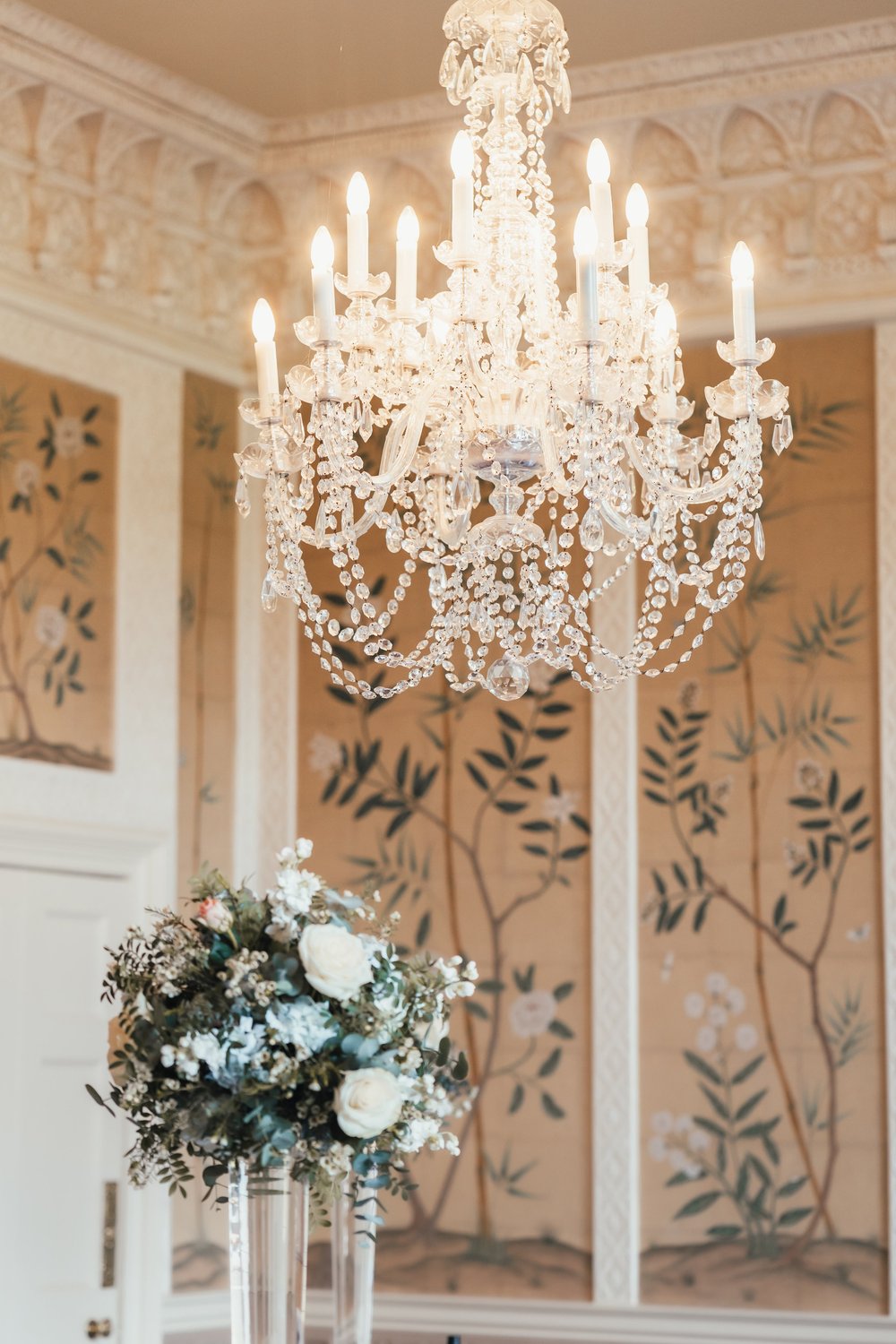 Chandelier and decorative wall detail inside Hampden House