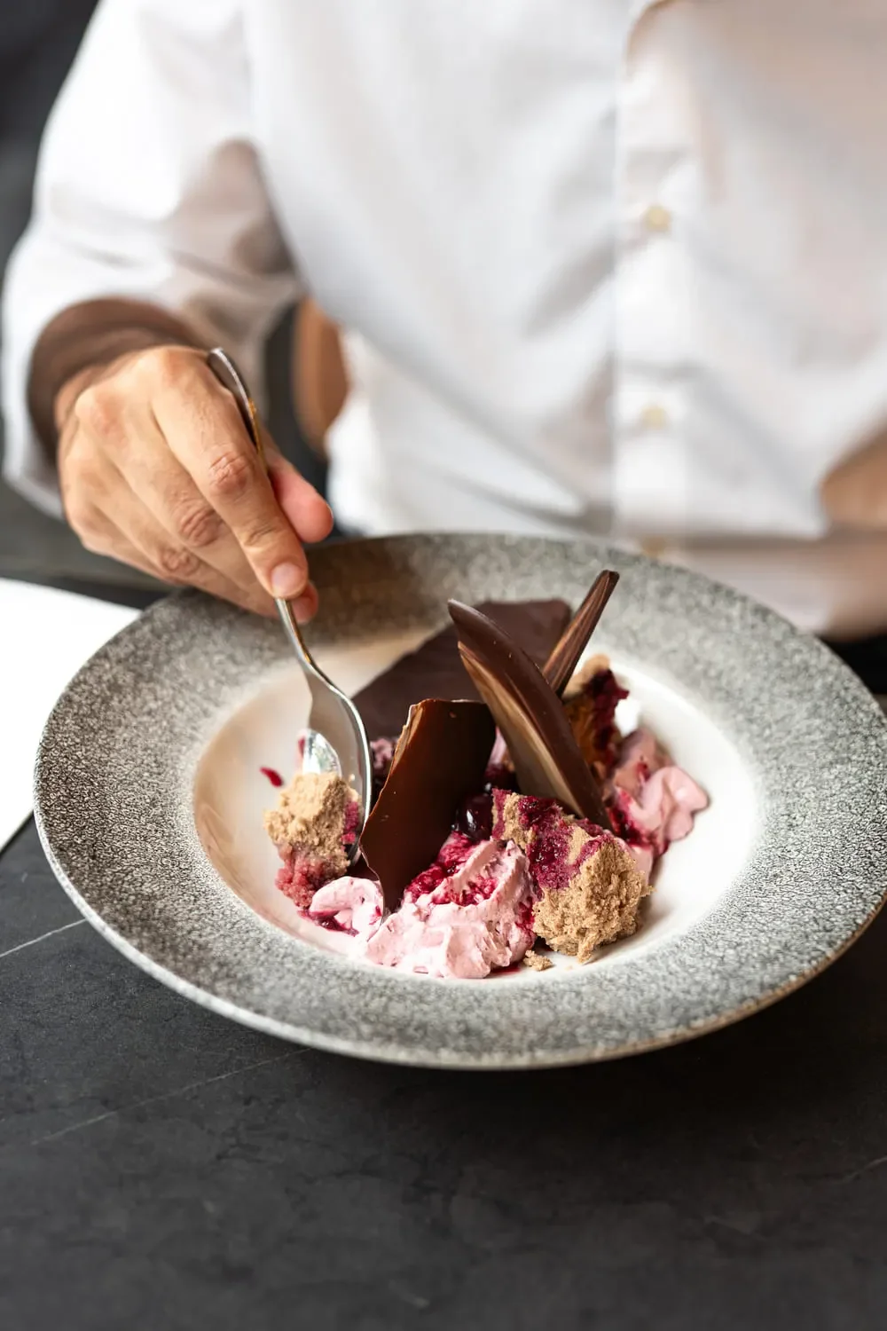 Deconstructed Black Forest gateau is prepared by chef