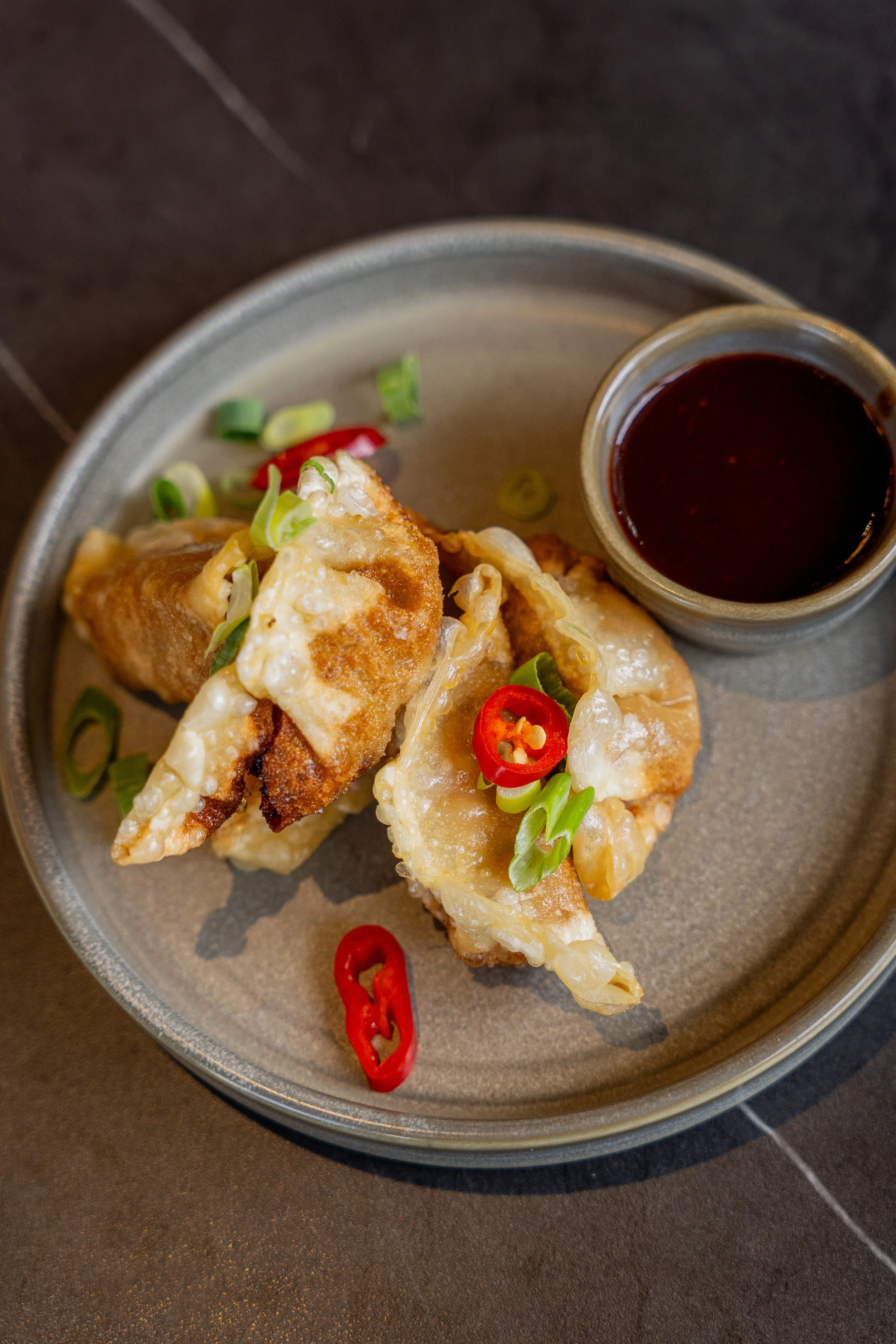 Shredded duck gyoza from The Engine Room small plates menu