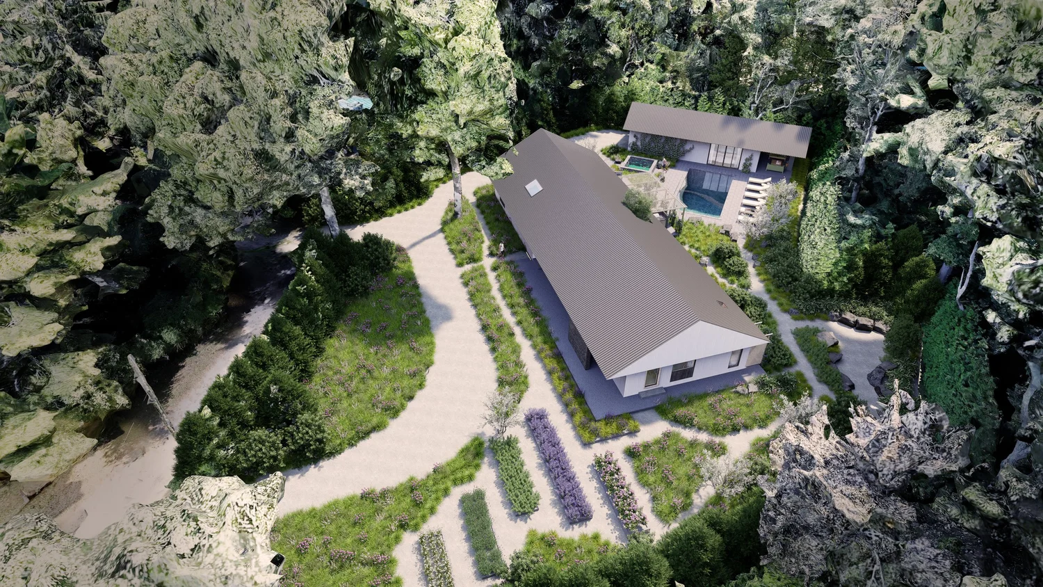 Aerial view of the house and garden within the wooded site