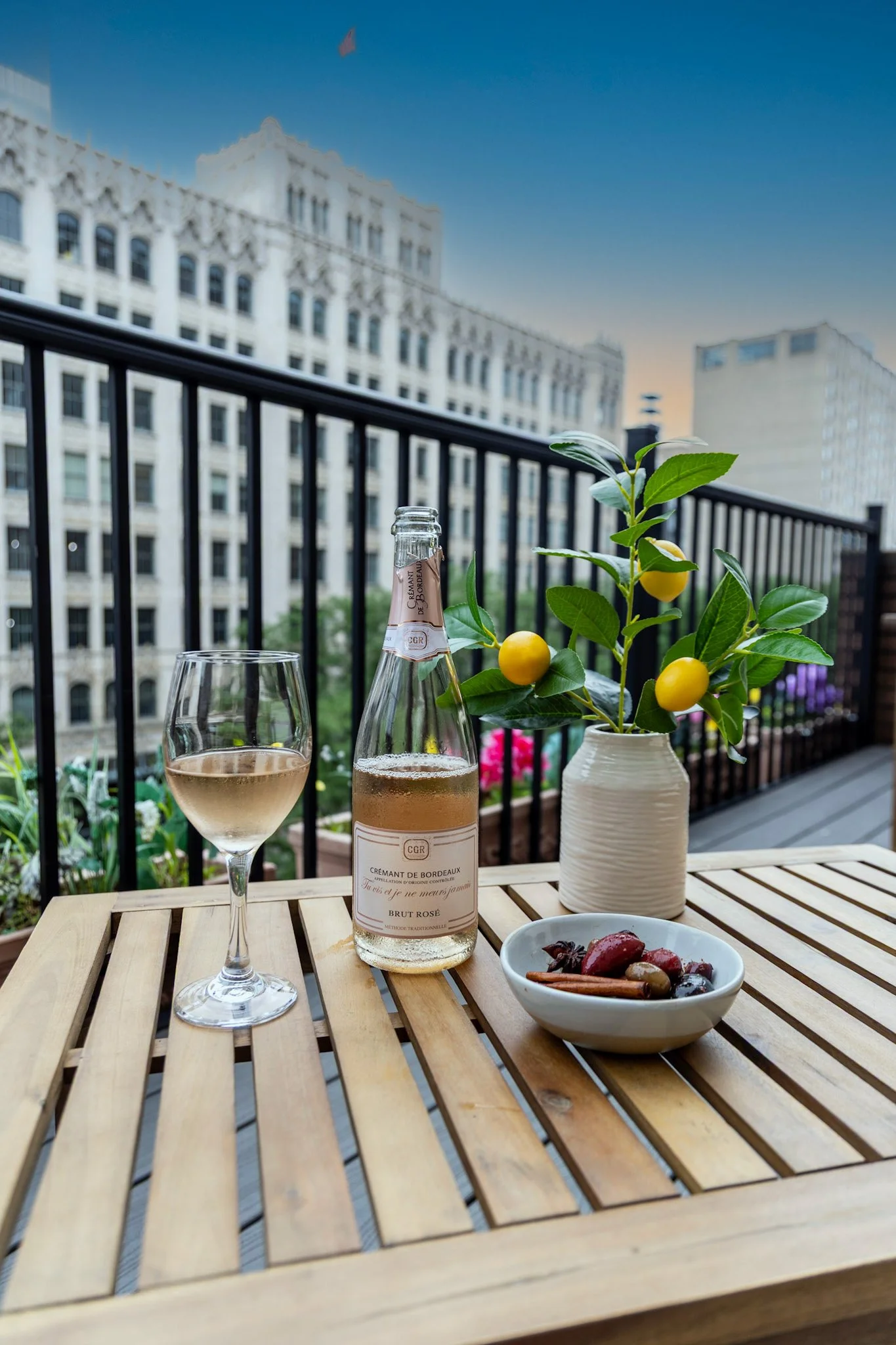Rooftop w wine & frankies olives & sunset.jpg