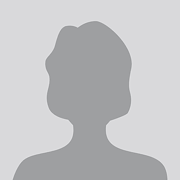 Silhouette of a person's head and shoulders against a light gray background