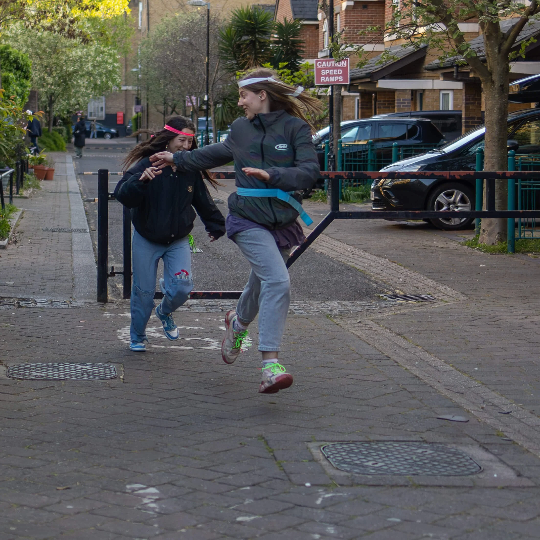 Journey until the End of the Night participants running through the streets during a London urban game event.
