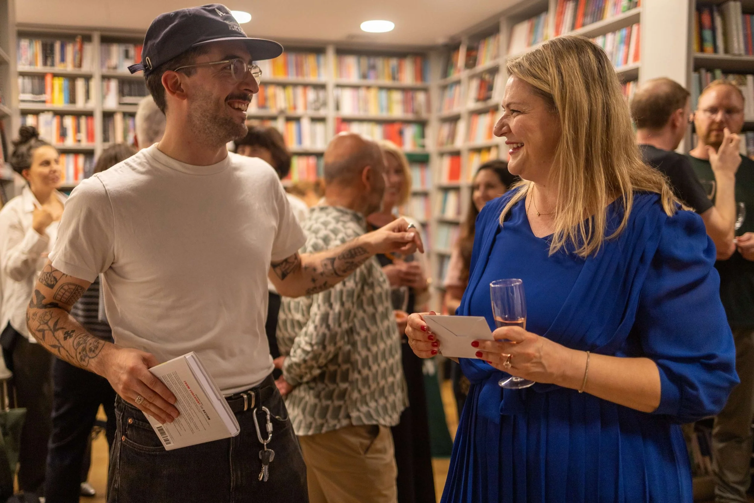 Author Joana Lenkova interacting with a guest at the launch of her book at the London Review Bookshop.