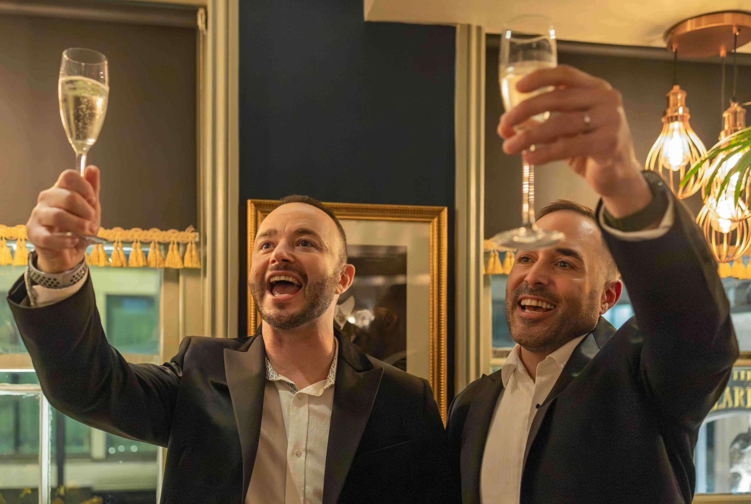 Guests celebrating at a London event photographed by Captured by Kasia