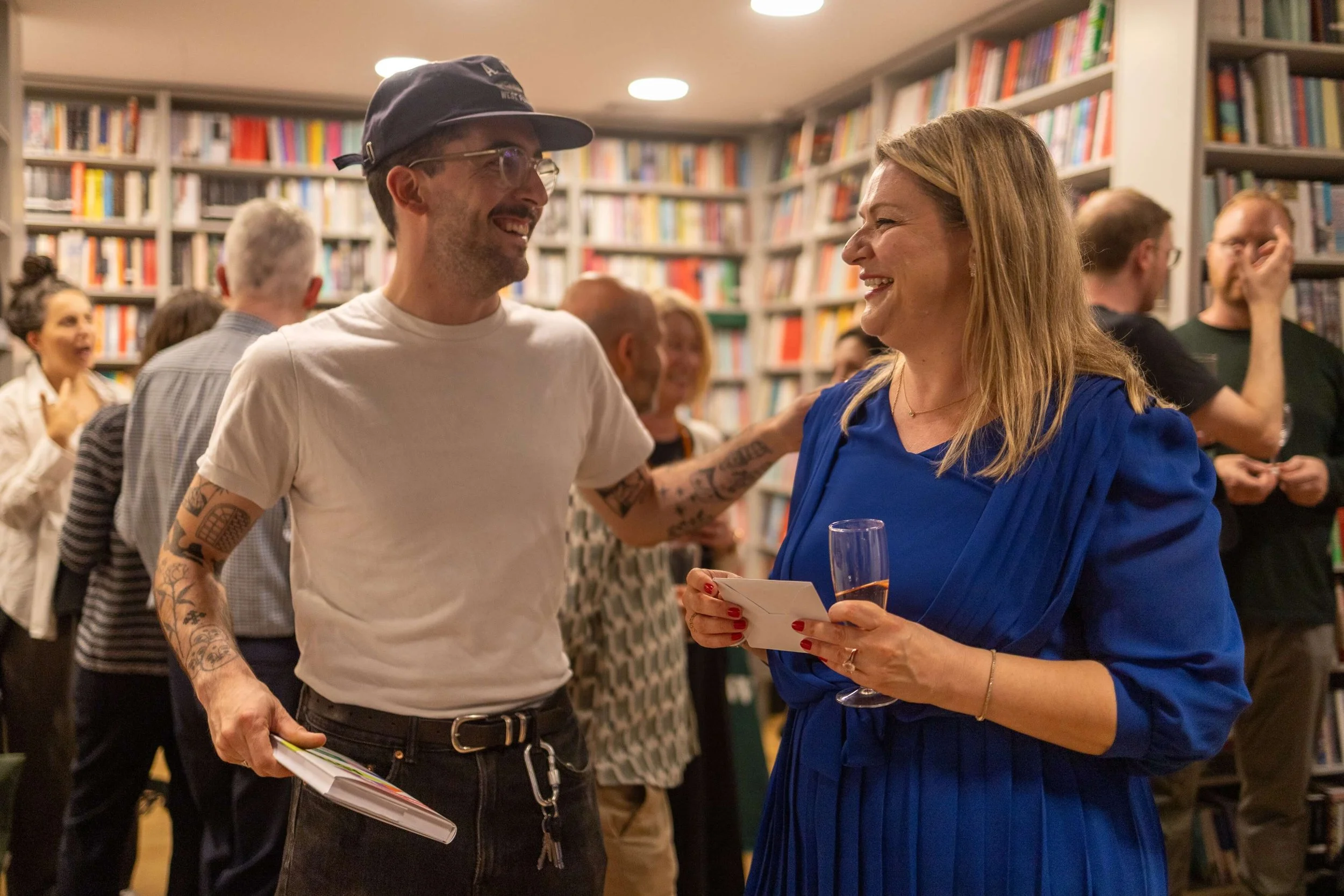 Joana Lenkova chatting with guests at her book launch in London