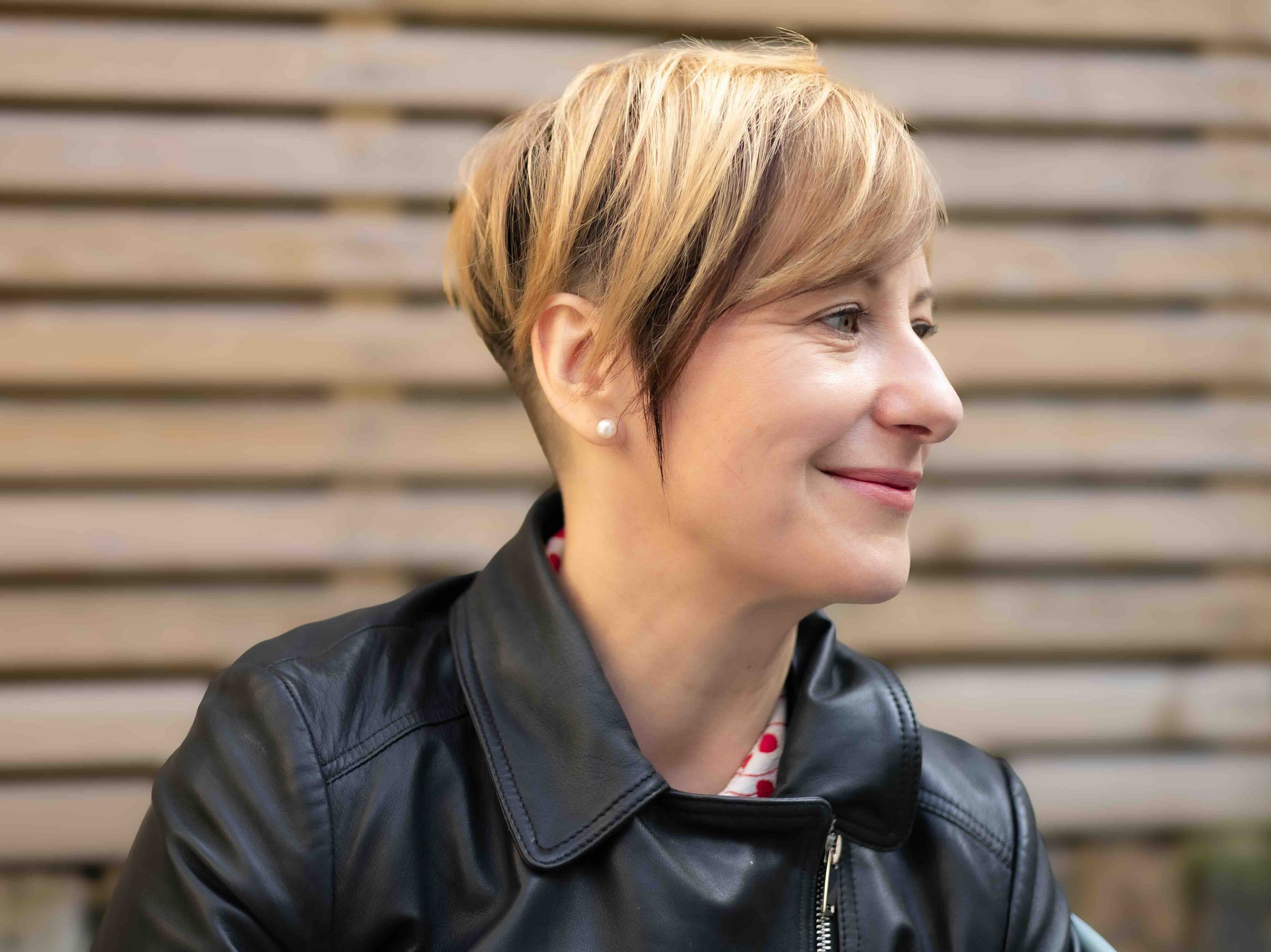 Kasia, London event photographer, smiling profile portrait