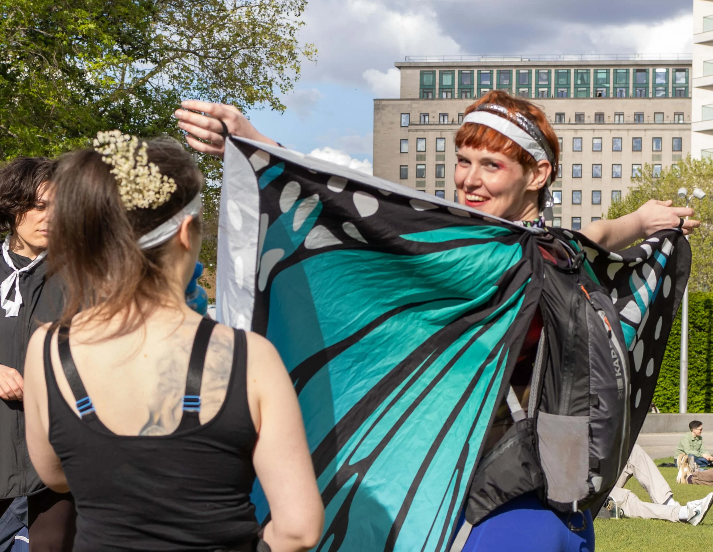 Participant wearing a colourful costume at the start of the London Journey until the End of the Night..