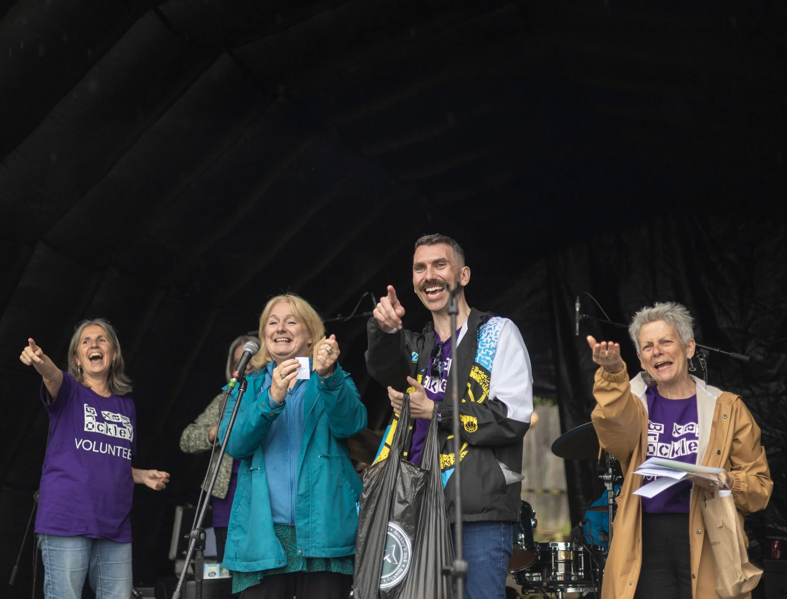 The organising committee and Brockley Max volunteers celebrating a raffle win.