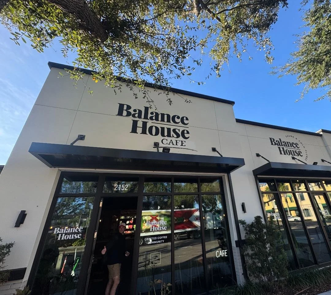 Balance House Café exterior in downtown St. Petersburg, a popular wellness and coffee stop easily reached by golf cart