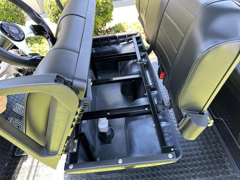 Hidden storage bin ideal for small items during your rental.