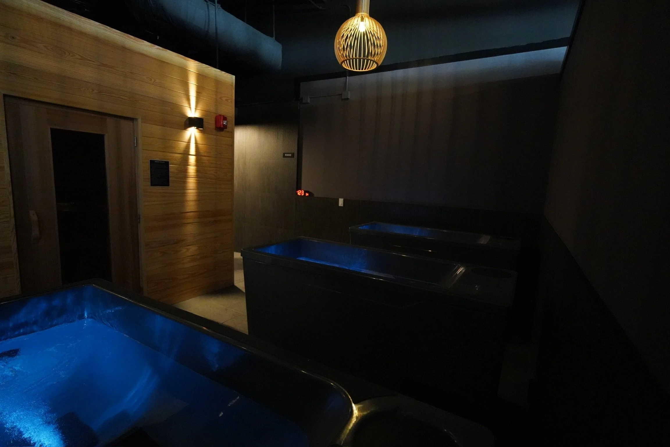Cold plunge pools and sauna at Balance House in downtown Saint Petersburg, Florida, a popular wellness stop by golf cart rental