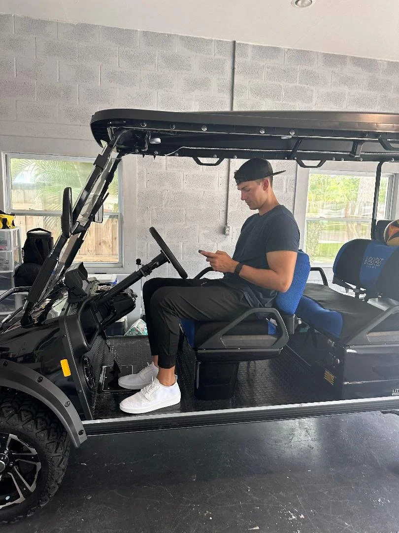 Side profile of our six passenger electric cart ready for St Pete adventures.