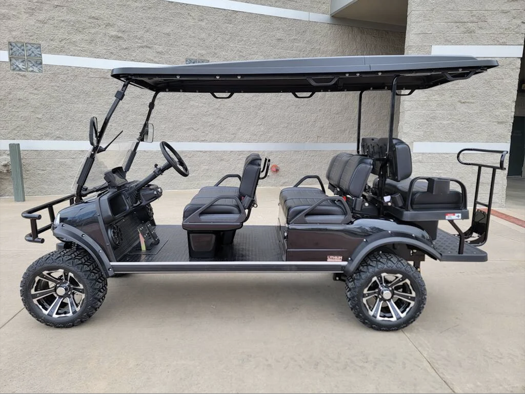 Complete side profile of our six passenger electric cart.