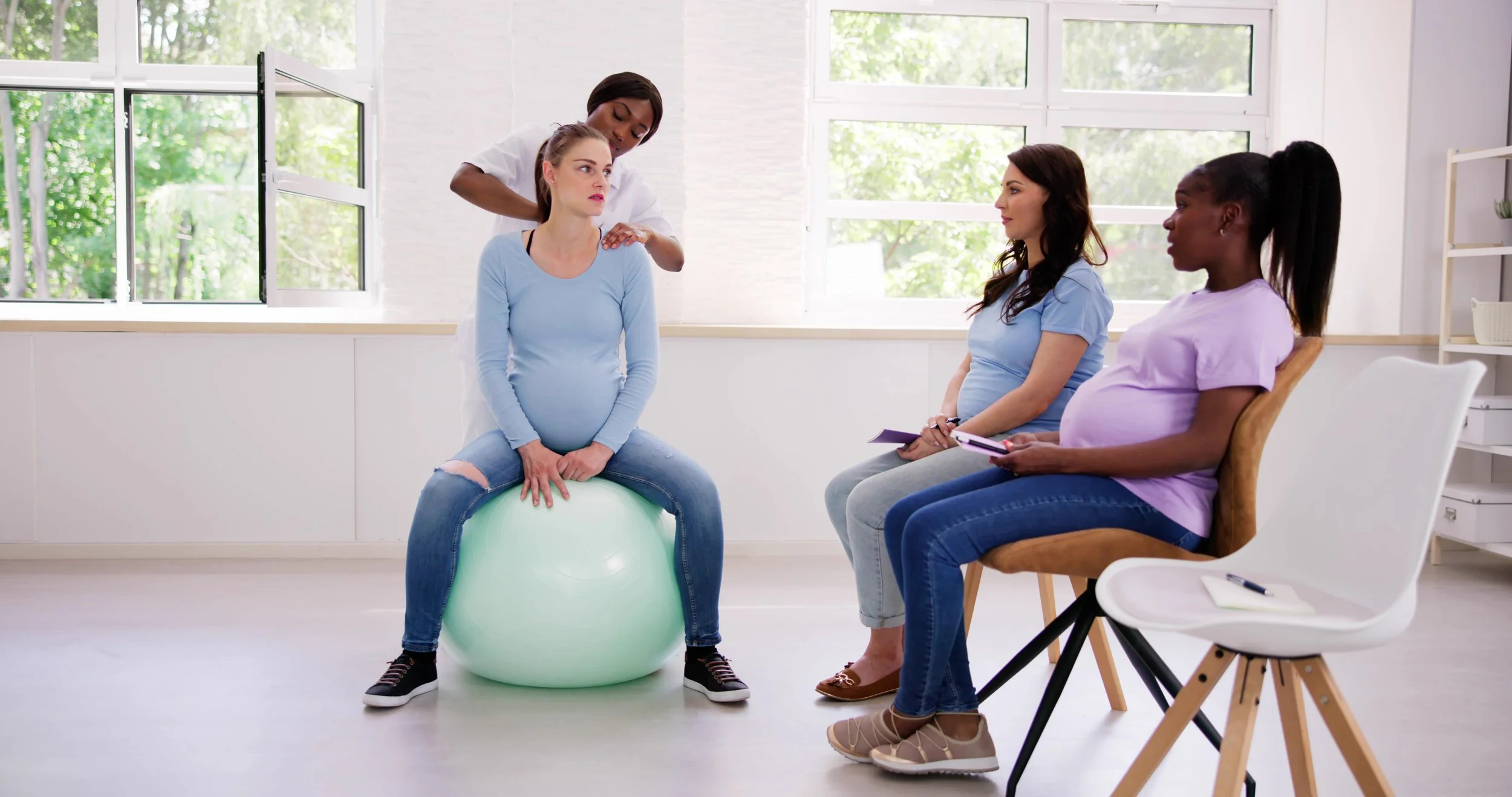 Woman teaching about pregnancy
