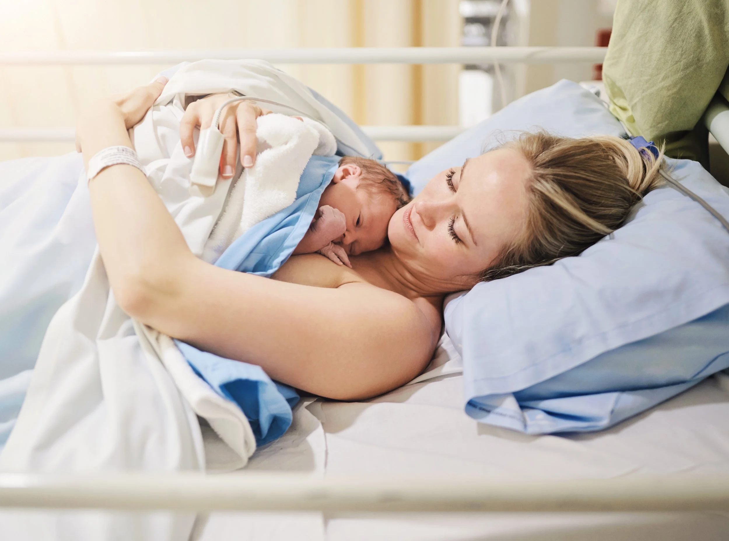 Woman with newborn baby