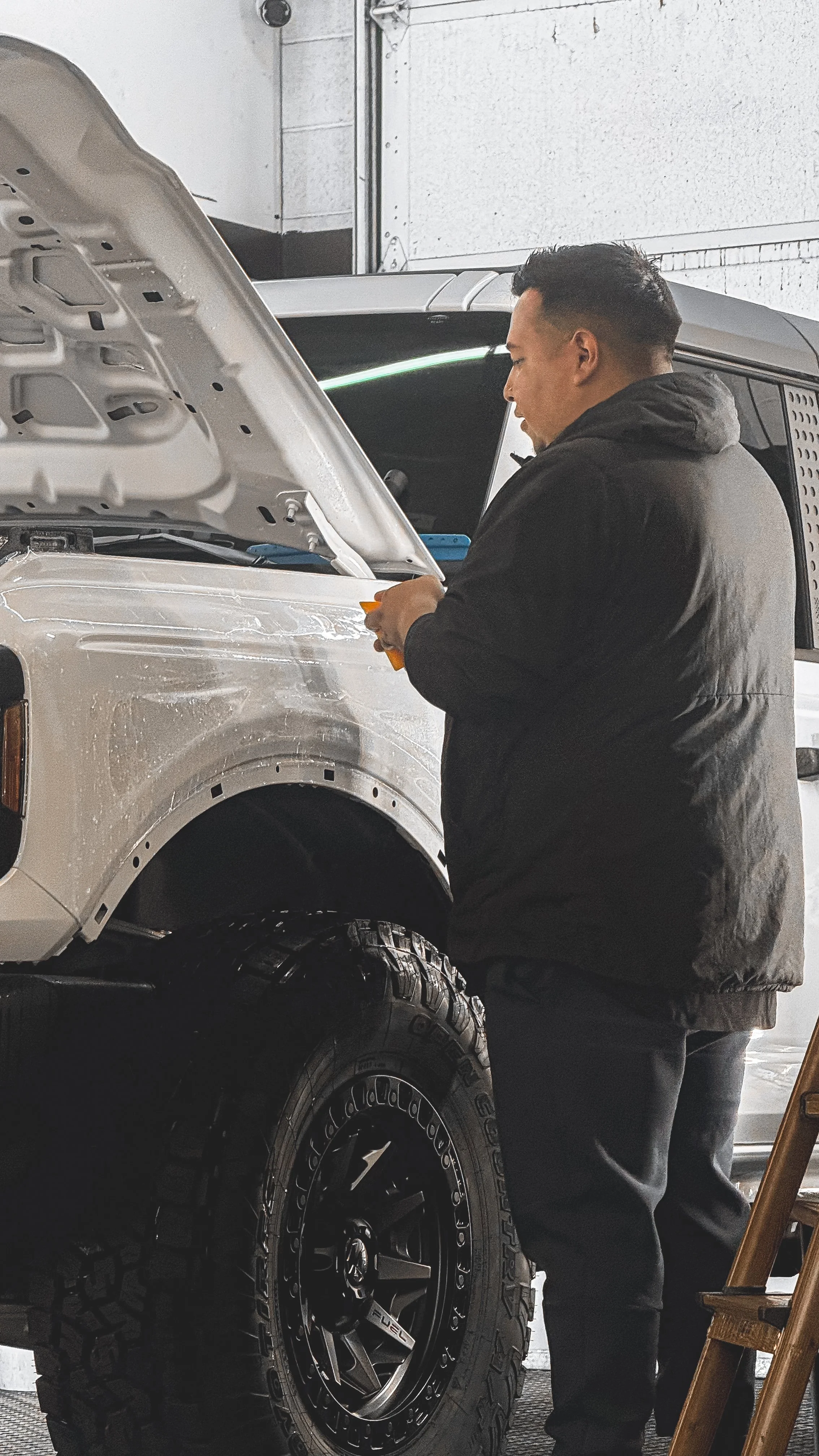White BRONCO front end with paint protection film installed