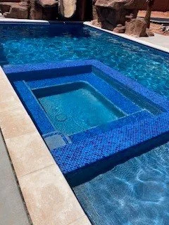 Integrated spa and pool utilizing SourcePoint advanced pool water treatment technology.