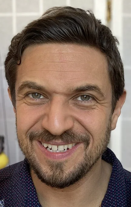 Headshot of David Ezra Stein