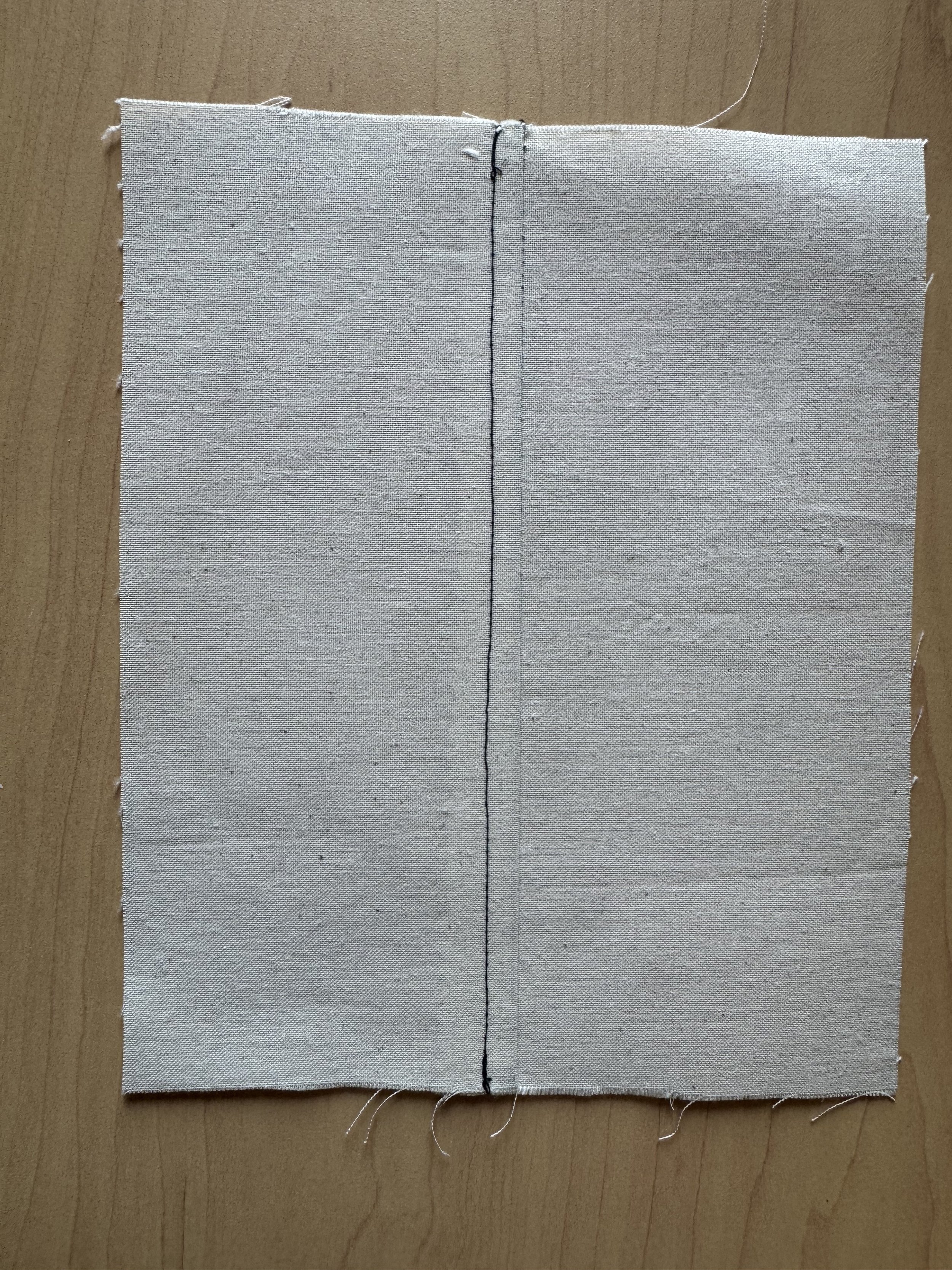 Permanent Seam with Top Stitching and pinked seam allowance finish
