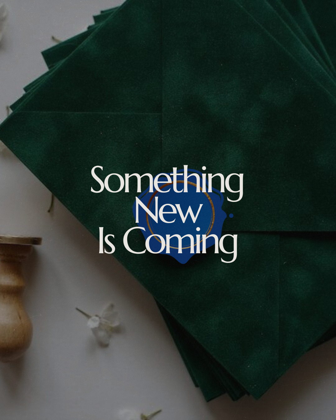 Green napkins with a blue and gold emblem and the text 'Something New Is Coming' overlaid.