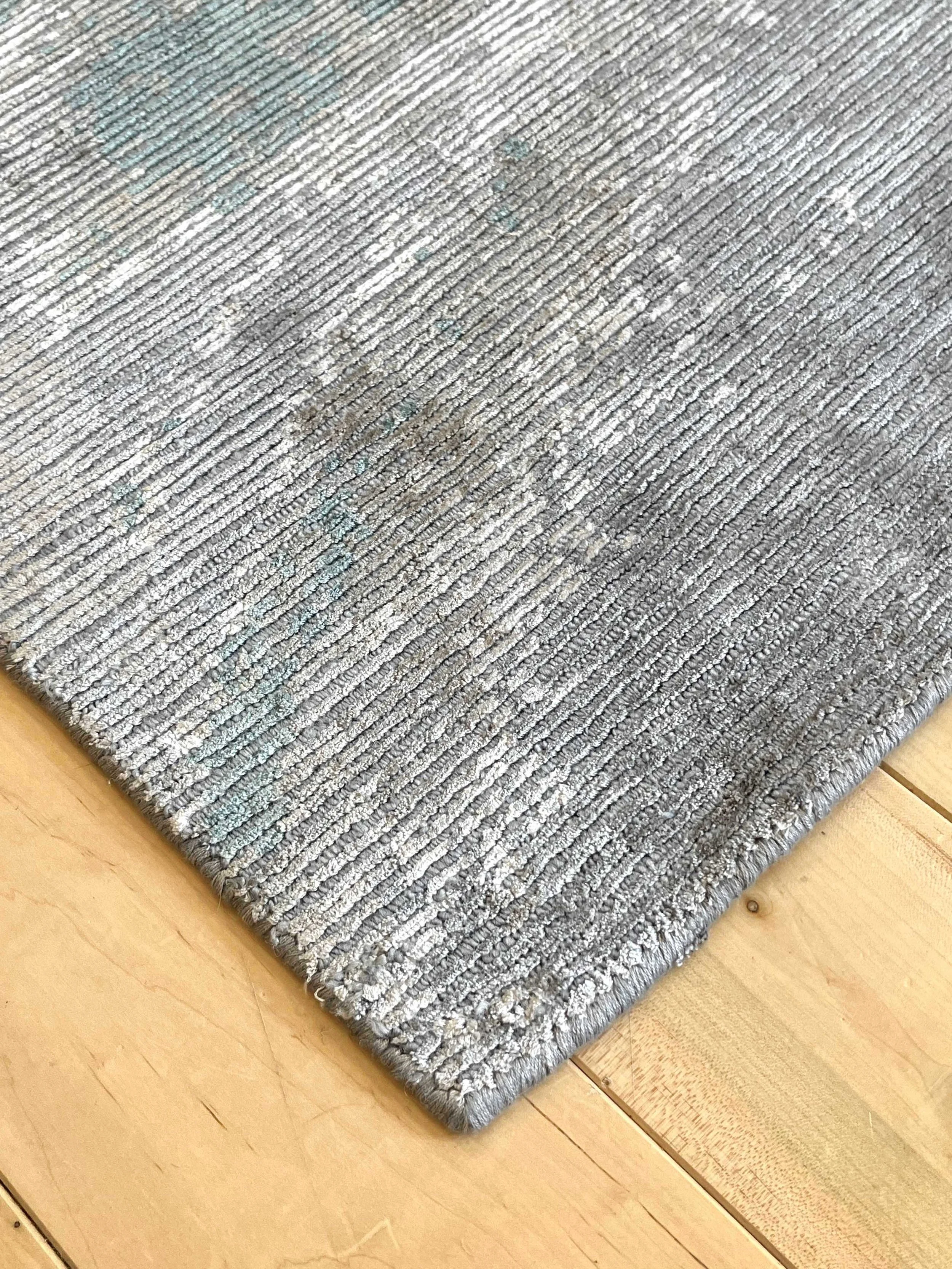 Flow shown in steel grey & jade 2x2.6 #102504 Tibetan Weave 50t-50  detail.jpg