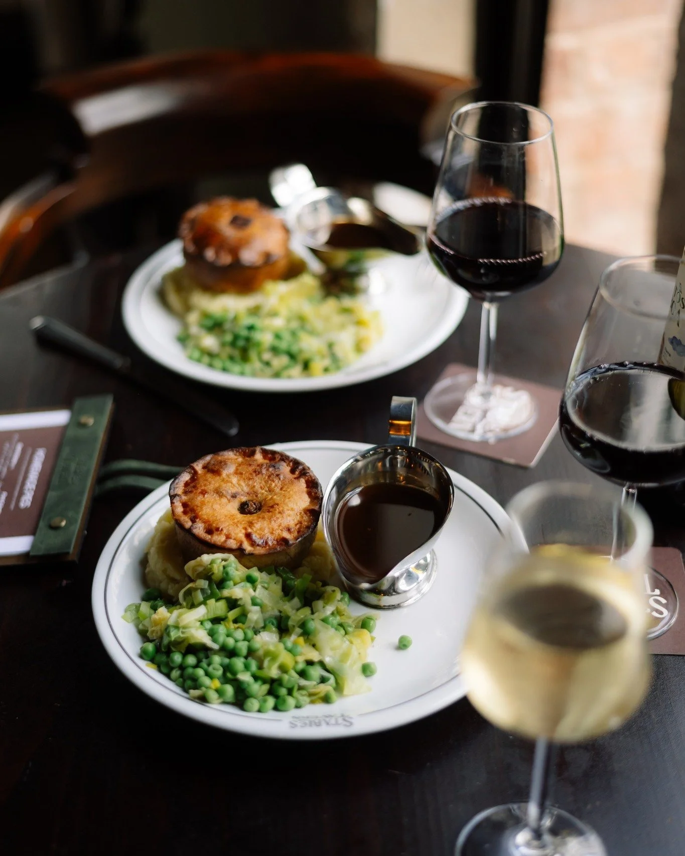A pub full of home comforts. 

Proper pies, proper pints, proper company.