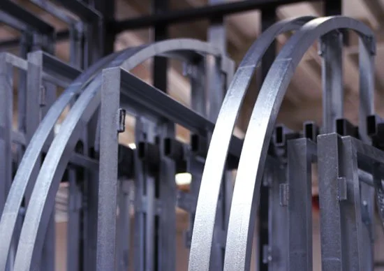Close-up of metal train tracks on a rail track.