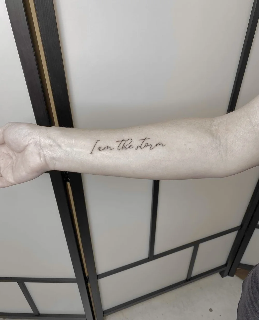 photograph of fine line tattoo design