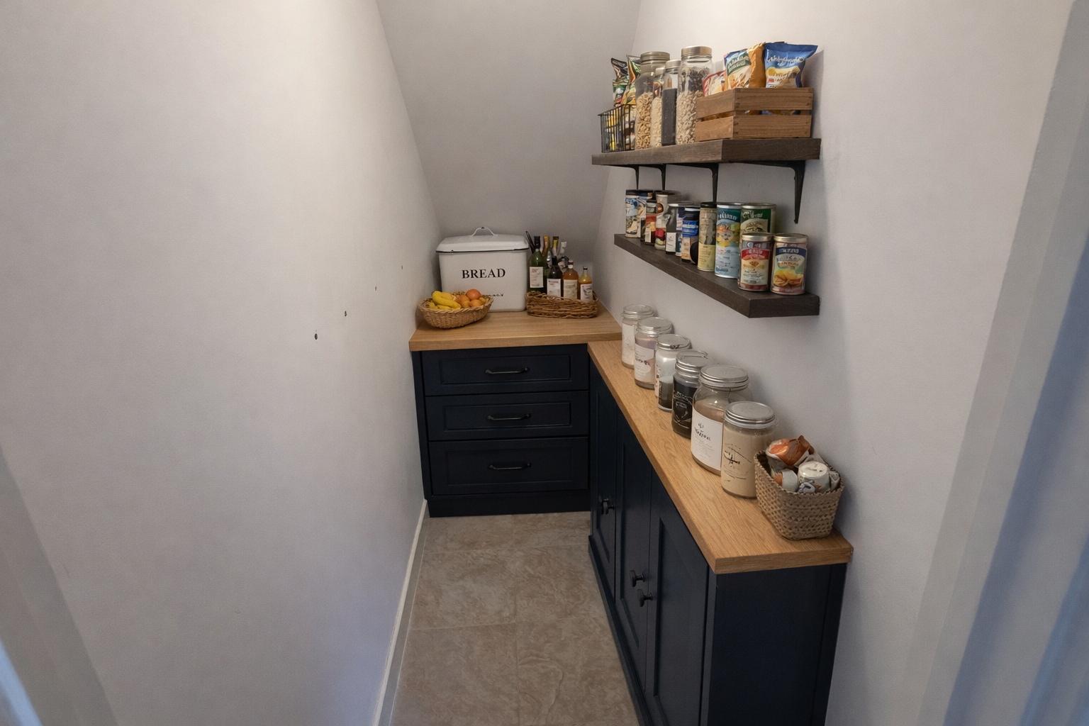 navy and oak understairs pantry