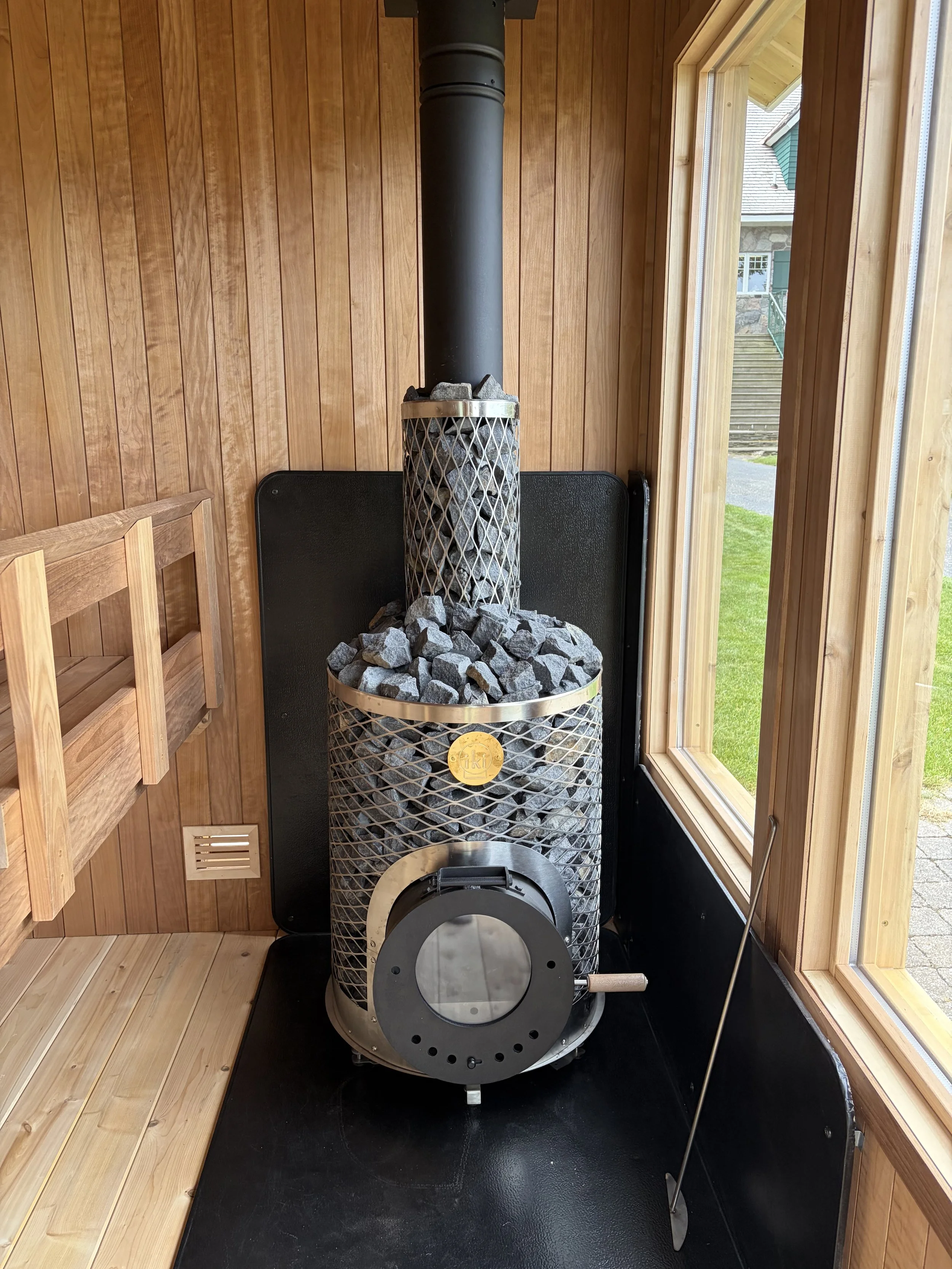 Charlevoix Boathouse Sauna_interior Iki stove.jpeg
