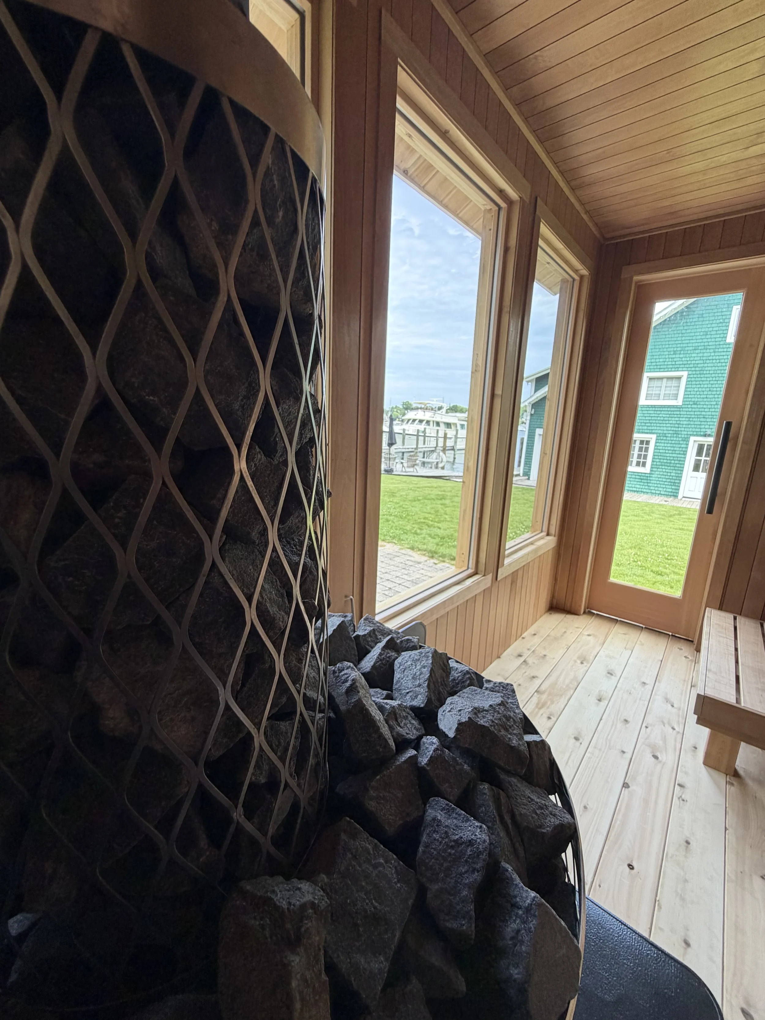 Charlevoix Boathouse Sauna_interior4 stove.jpeg