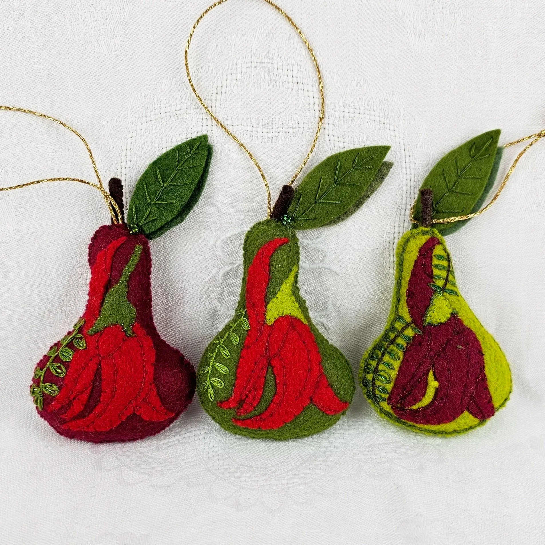 commission kaka kākā beak flower trio pear decoration decorations where to buy commission felt work Sara Meade Design Sarah NZ Artist Small Business Kiwi Aotearoa New Zealand