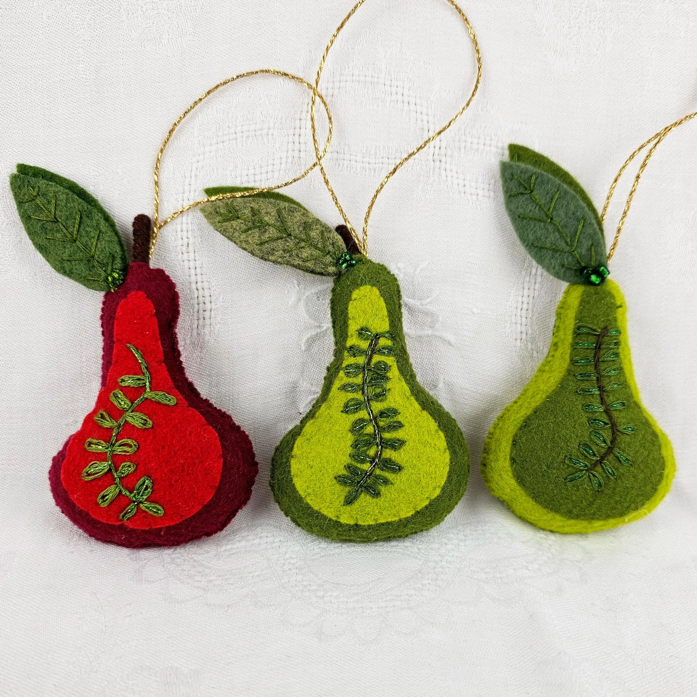 commission kaka kākā beak flower trio pear decoration decorations where to buy commission felt work Sara Meade Design Sarah NZ Artist Small Business Kiwi Aotearoa New Zealand