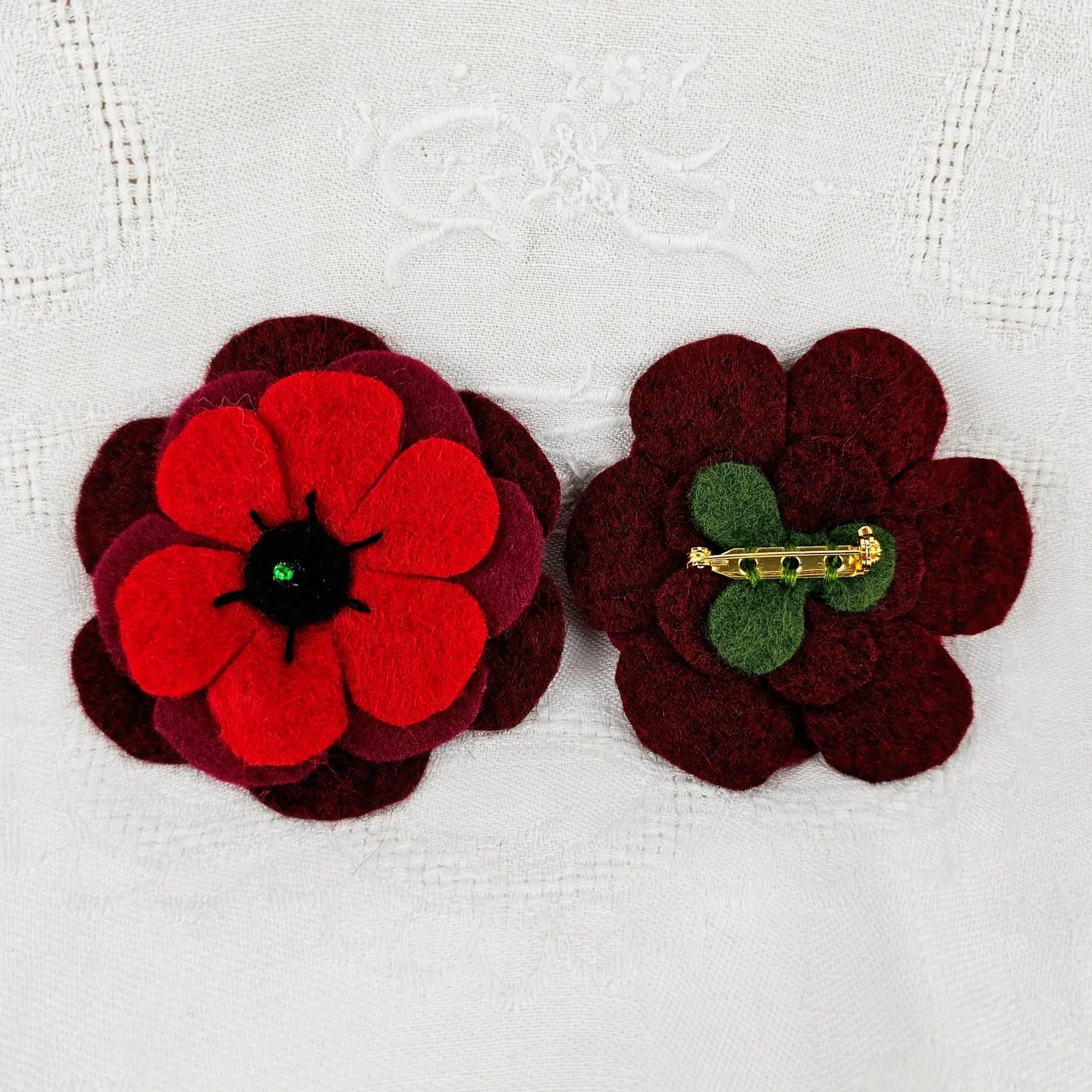 ANZAC Day poppy brooch pin flower memorial decoration decorations where to buy commission felt work Sara Meade Design Sarah NZ Artist Small Business Kiwi Aotearoa New Zealand