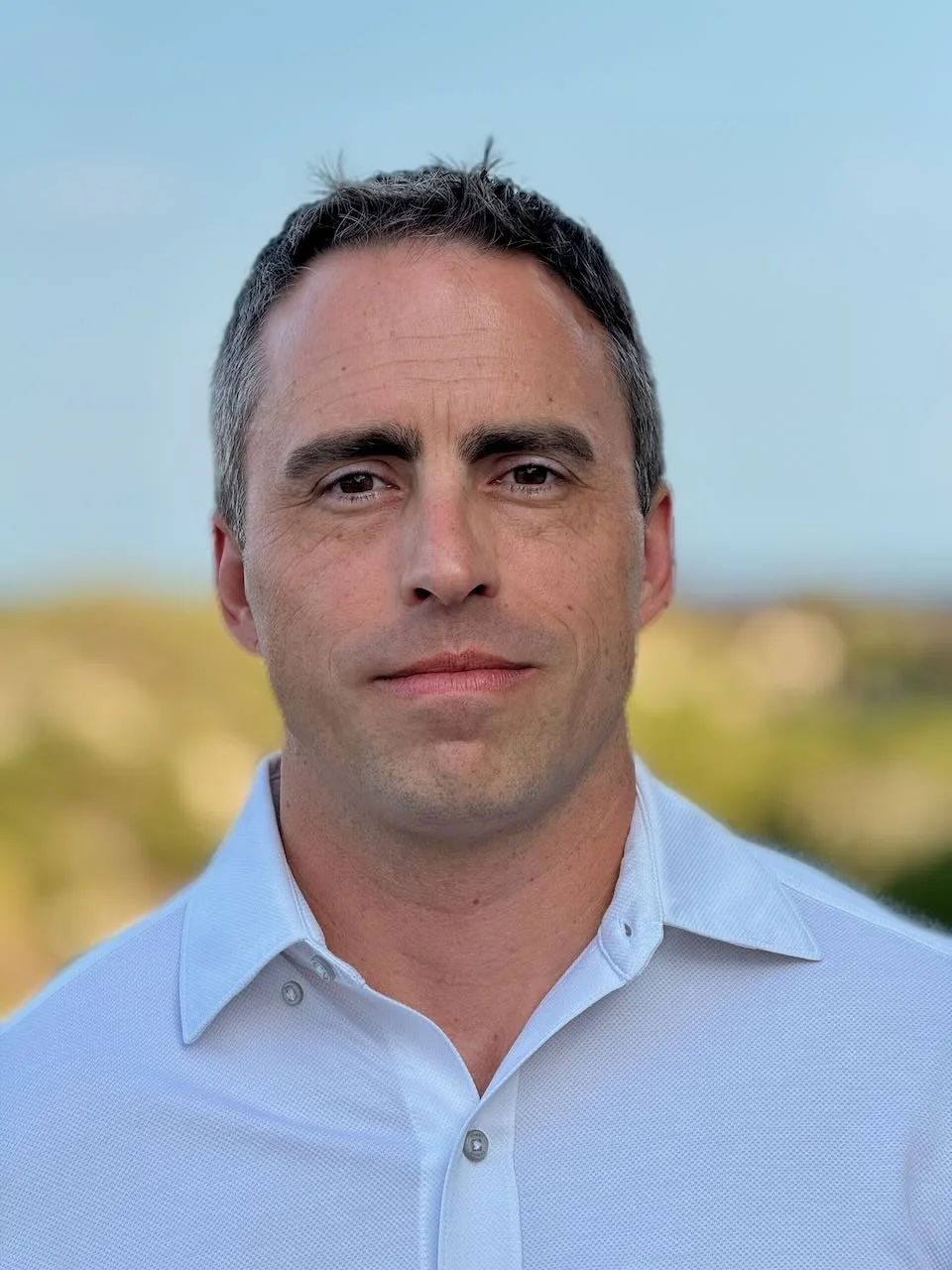 A headshot of Dr. Dusek