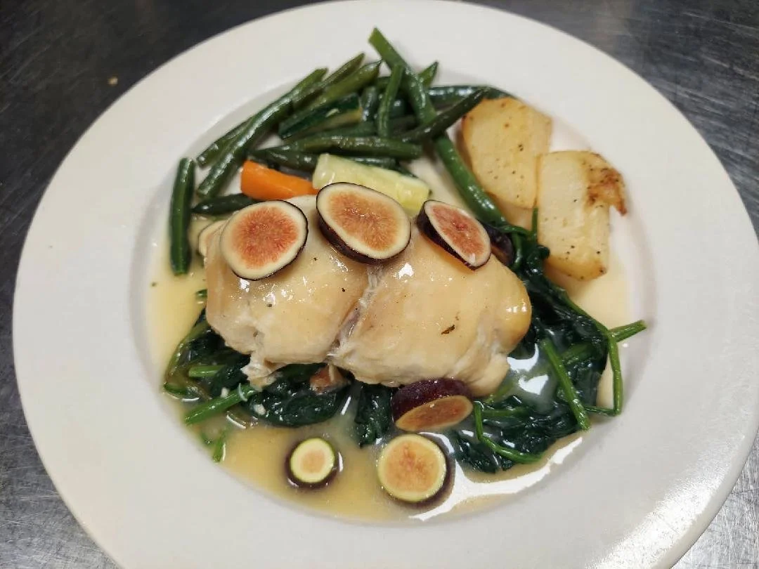 red snapper stuffed with crabmeat topped with figs