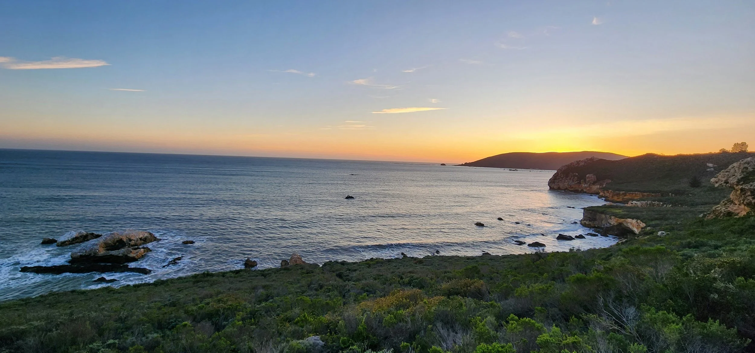 Image of beach promontory at sunset