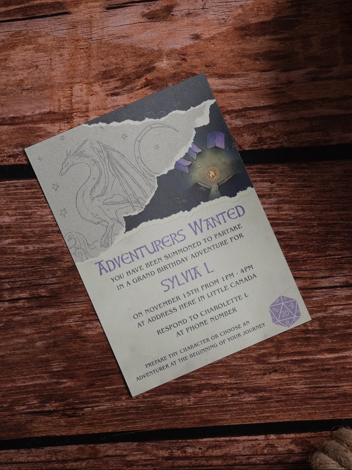 A printed invitation or flyer on a wooden surface for a birthday adventure themed event, featuring a dragon and a moon illustration, with details about date, time, location, and RSVP instructions.