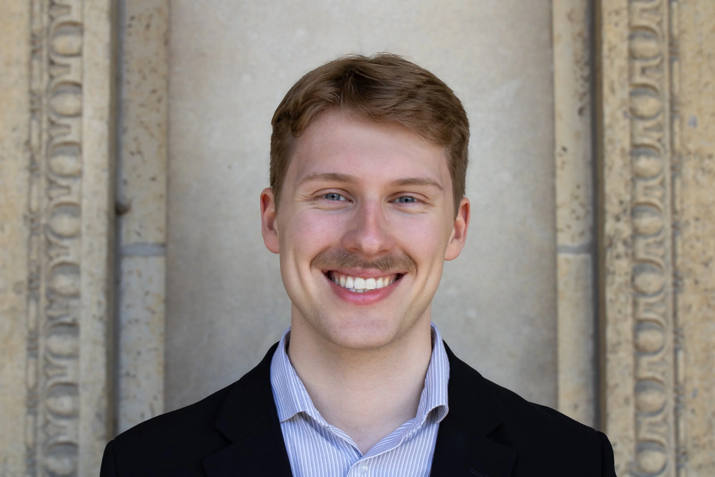 2025_4_Andrew_Headshot_EB_2.jpg