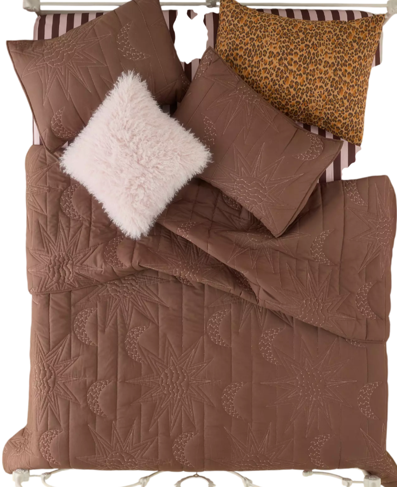 Embrace celestial vibes with this UO exclusive bedding set by Jungalow and Justina Blakeney, featuring quilted stitching creating intricate sun and moon motifs allover. Includes a sun and moon quilt and two shams with split-opening backs. Available e