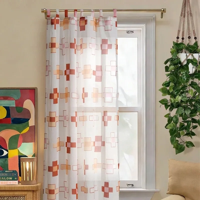 Jungalow Aritha Sheer Curtains 
All plusses, no minuses! Sun-washed plus signs in clay, blush, and terracotta are scattered across a delicate, sheer ivory ground, bringing warmth, rhythm, and feel-good energy to your windows.