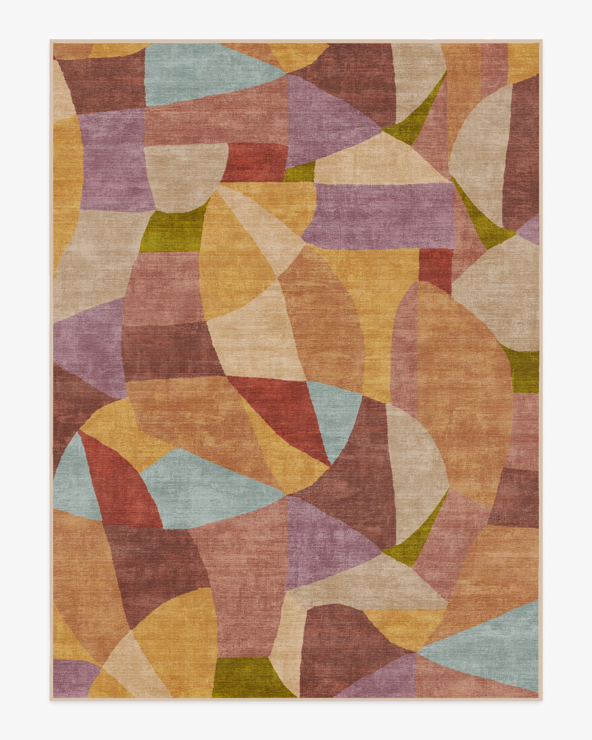 Flock to color blocks. The Kayla Rust Multicolor Rug is a large-scale abstract composition of fragmented color blocks, translated from Justina Blakeney's original artwork. Soft yellows, mauves, rose, and lavender are accented with pops of blue, citro
